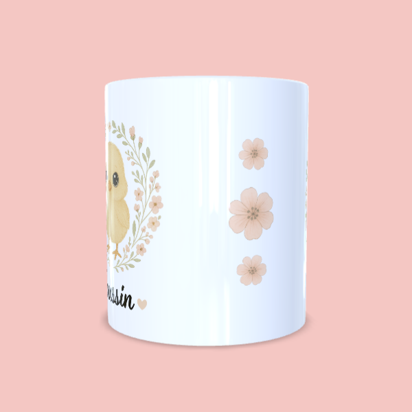 mug-poussin-f-2 Mug poussin avec couronne de fleurs et liseré de fleurs au centre.