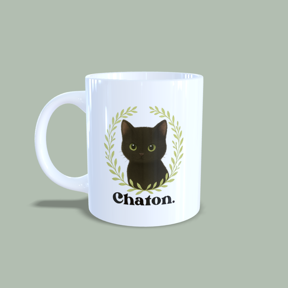 Mug chaton noir couronne de feuilles anse à droite.