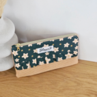 Pochette modèle Lila en velours côtelé orange et coton vert fleuri.