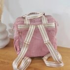 Sac à dos modèle Ava, en velours côtelé vieux rose et intérieur bleu foncé à petites fleurs