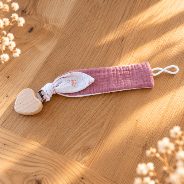 Attache tétine rose et fleurs blanche et coeur