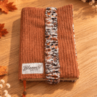 protege-livre-orange-fleurs-feuilles-poche-dessus